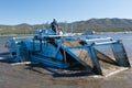 Big Bear Lake, California, June 17, 2016 Ã¢â¬â An aquatic weed harvester removes weeds from the lake in preparation for the Big